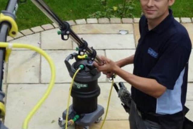 Ashley Mackintosh has been a window cleaner for 20 years and is now taking on the world record for fastest window washer