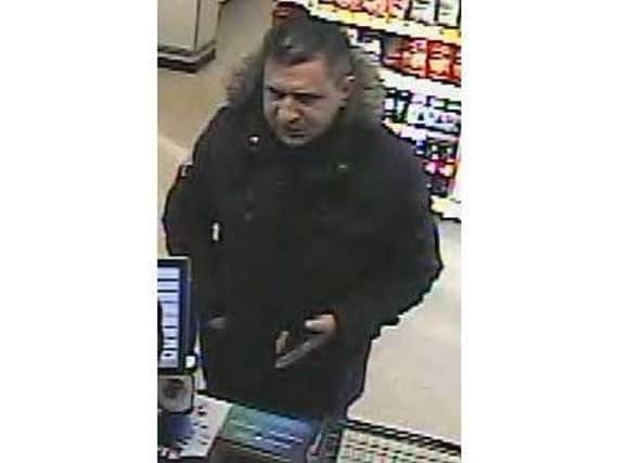 Police are searching for this man in relation to a credit card theft.