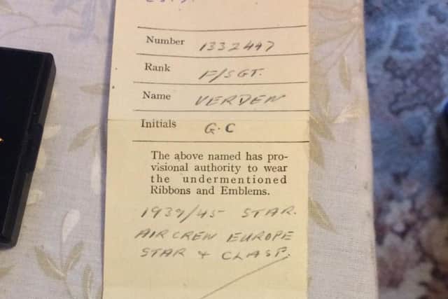 The slip of paper, dated June 20, 1944, entitling George to his medals.