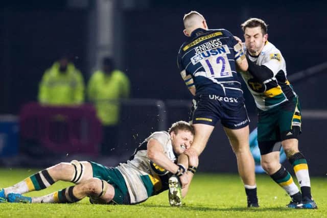Jamie Gibson and Stephen Myler got stuck in