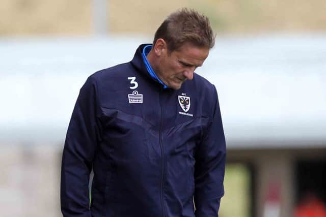 Dons boss Neal Ardley