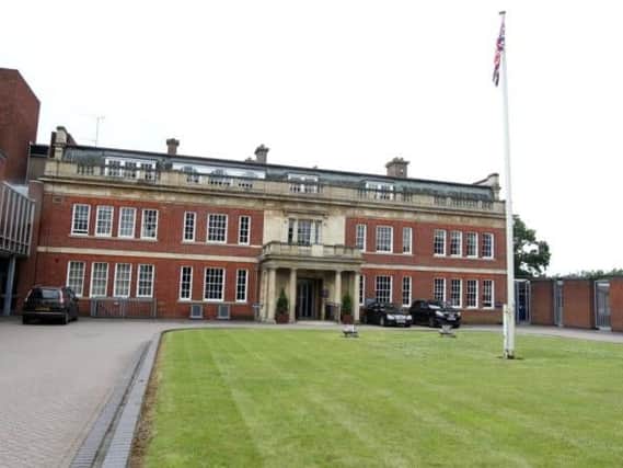 Wootton Hall headquarters was due to be sold, but an agreement has been reached for police and fire services to remain on site.