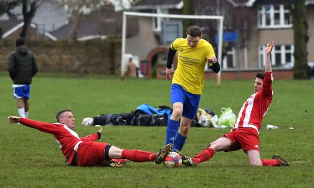 GANGING UP - action from Queen's Park's win over Hartwell (Pictures: Dave Ikin)