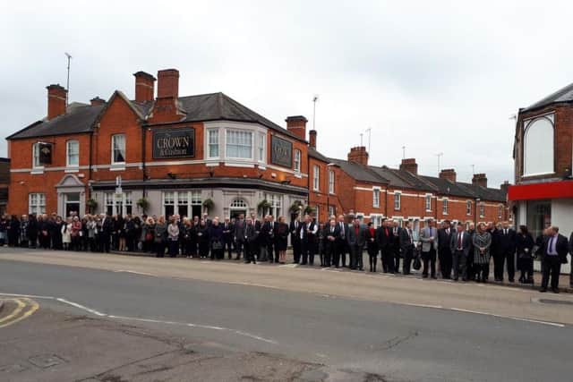 Hundreds line the street outside the Crown & Cushion for Pete's procession.