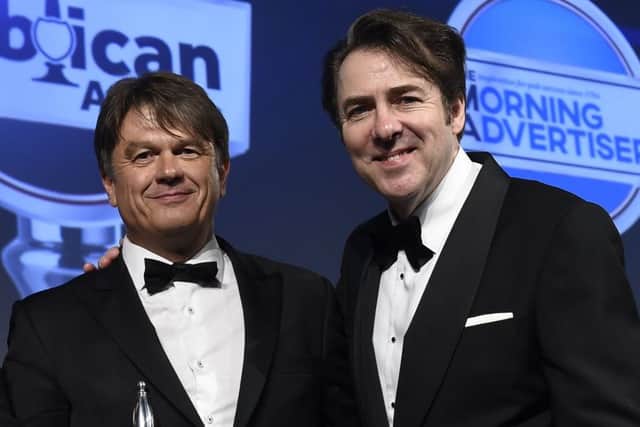 SMIDS Jonathan Ross (L) presents award to Peter Borg-Neal, CEO Oakman Inns