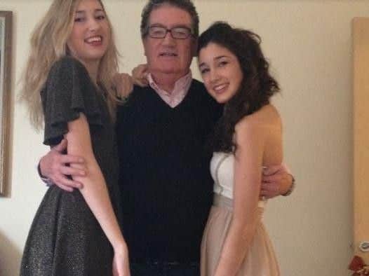 Richard, who died in January last year from a brain tumour, with his and Frances' two daughters.