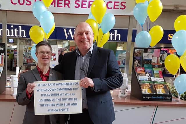 Weston Favell shopping centre favourite Danny with centre manager Kevin Legg.