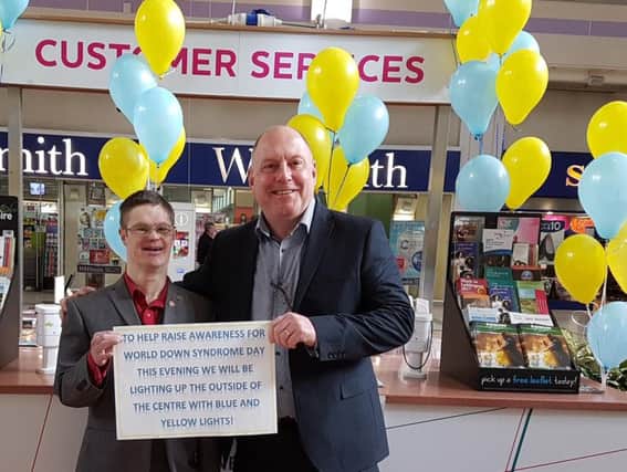 Weston Favell shopping centre favourite Danny with centre manager Kevin Legg.