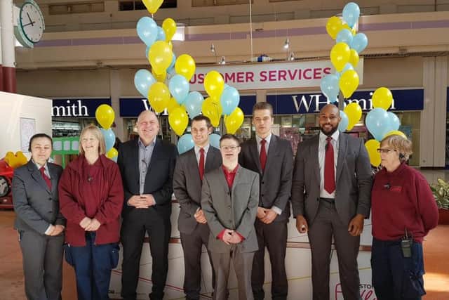 Danny with the staff of Weston Favell shopping centre.