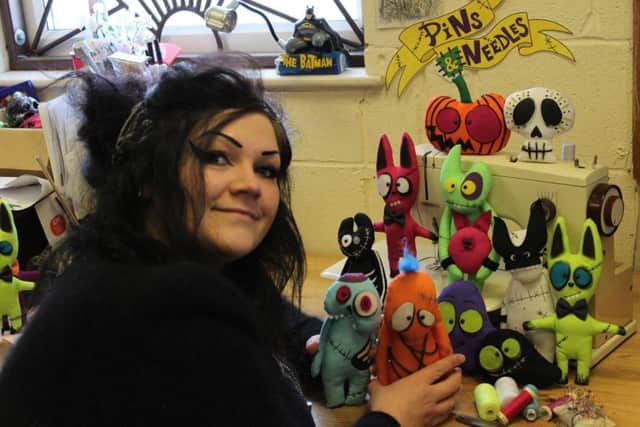 Victoria Malin and her dolls