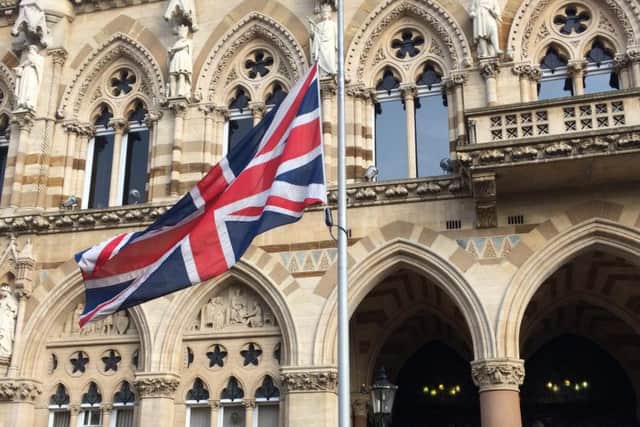 A Union Jack flies at half mast outside the Guildhall in Northampton today.