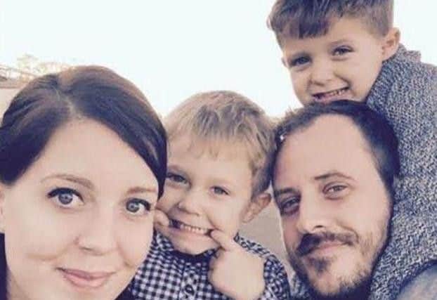 Matt with his wife and two sons