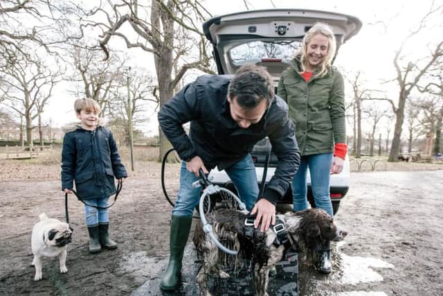 The 360-degree dog shower lets them wash them off after a muddy walk.