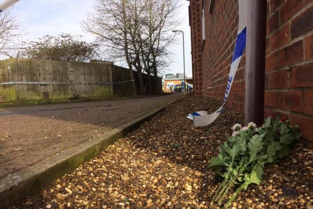 Flowers were laid at the scene of Liam Hunt's killing.