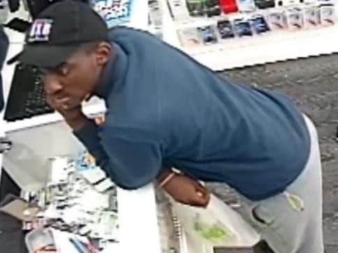 CCTV pictures show a man who may have information about an attempted robbery in a Northampton tech store