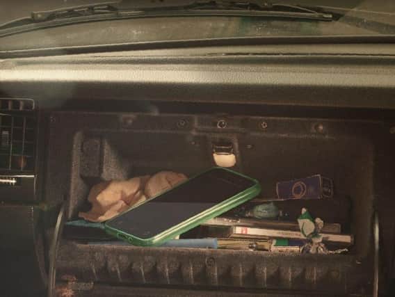 Police say phones should be kept in glove boxes