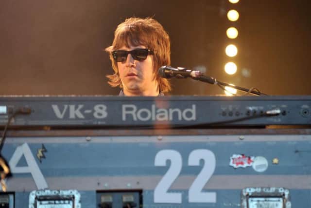 Andy Crofts playing the keyboards for Paul Weller at Delapre in 2013