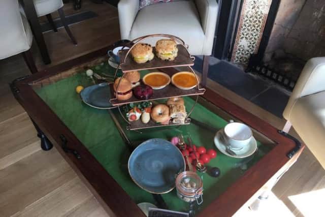 The first afternoon tea was yesterday served in the Billiard Room.