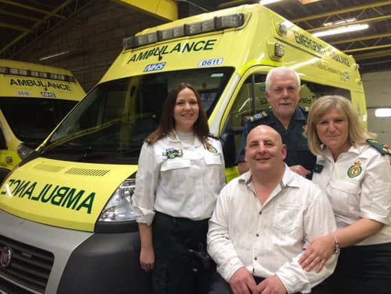 Peter (centre) with Karen, Paul and Gill - the team who saved his life.