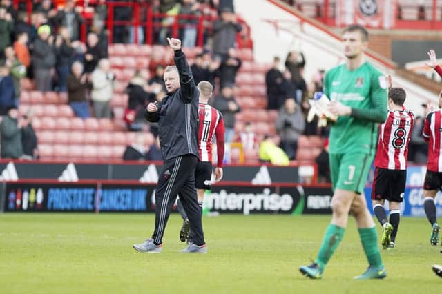 THUMBS-UP: Chris Wilder acknowledges the Cobblers fans after the reverse fixture at Bramall Lane. Pictures: Kirsty Edmonds