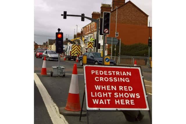 The temporary traffic lights in Weedon Road have caused chaos in the past few days.