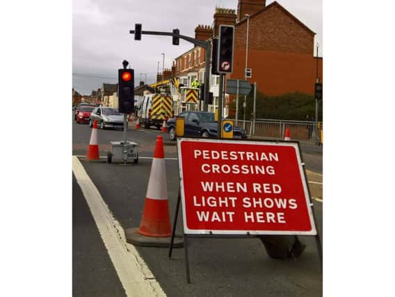 The temporary traffic lights in Weedon Road have caused chaos in the past few days.