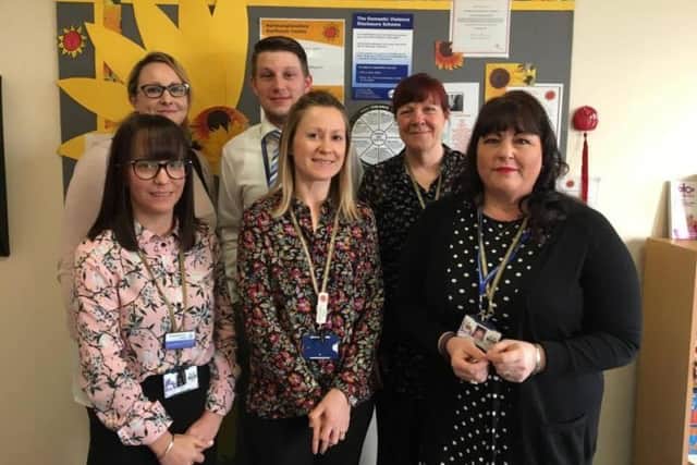 (Back left) DART officer, Chloe with the Sunflower Centre team