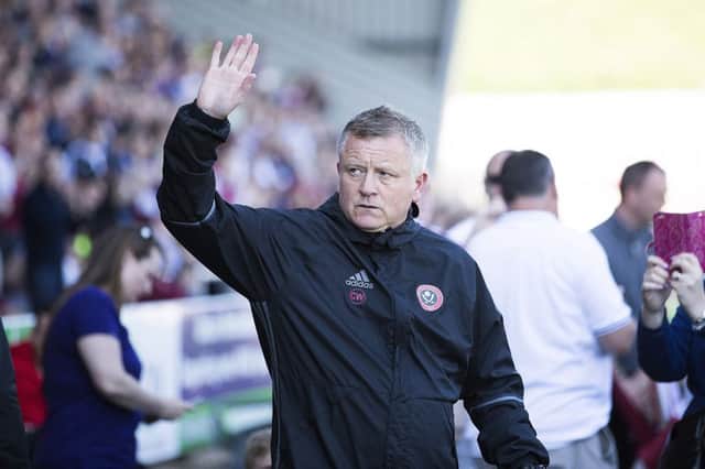 BACK IN TOWN: Chris Wilder was given a warm welcome on his Sixfields return. Picture by Kirsty Edmonds