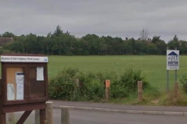 A man was head-butted by a dog walker following a row in a Wootton playing field.