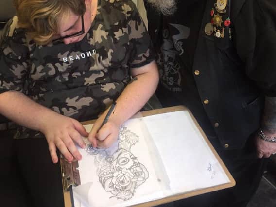 Tattooist, Stuart Rolls will be delivering master classes to students, with his son, Thomas, who is a Level 1 art and design student at Northampton College.