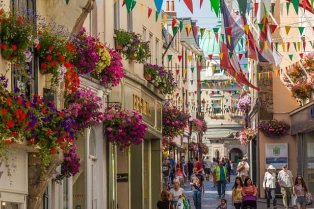 A floral street in St Peter Port, Guernsey