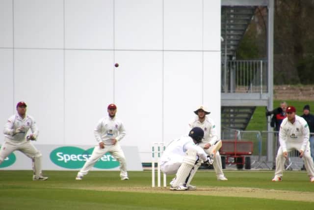 Action from the opening day of Northamptonshire's clash at Derbyshire