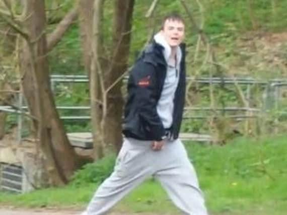 An onlooker snapped this man shortly after he threatened a woman with a baseball bat in Northampton.