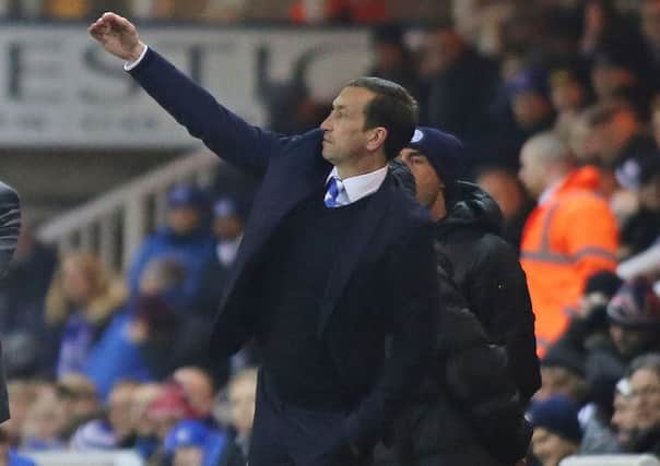 Justin Edinburgh spent two years as manager of Gillingham