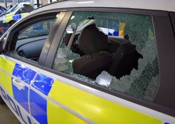 The damaged car.