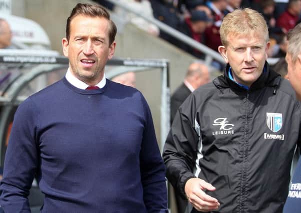 Cobblers boss Justin Edinburgh and Gillingham counterpart Ady Pennock prior to kick-off (Picure: Sharon Lucey)