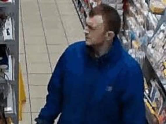 A picture has been released following an alleged supermarket alcohol theft in Northampton.