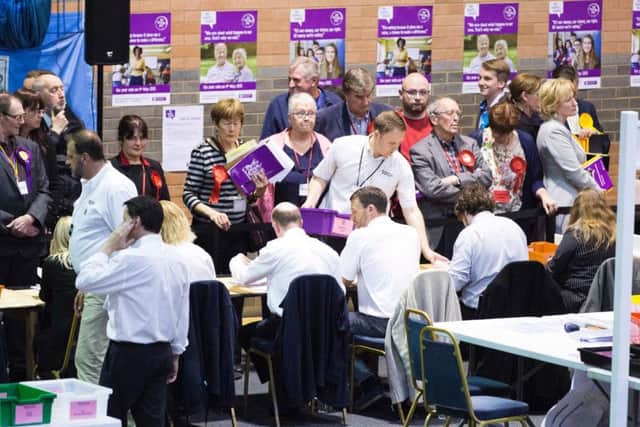 Labour councillors ponder the results at this afternoon's count in Kettering. The party took seven wards in Northampton.