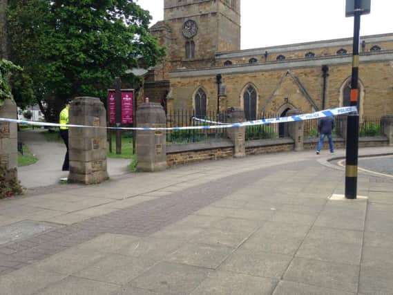 The cordon around St Giles Church this morning.