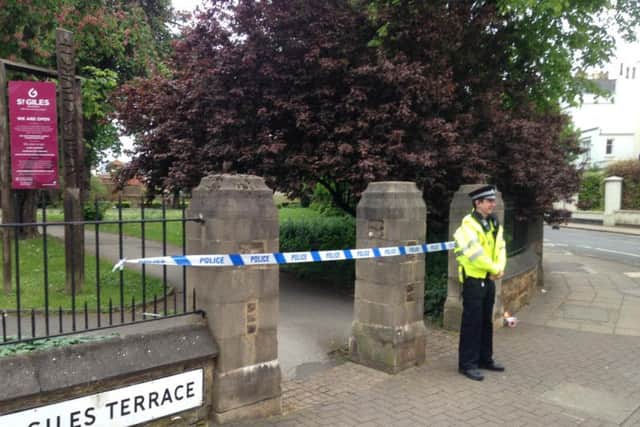 The cordon around St Giles Church this morning.