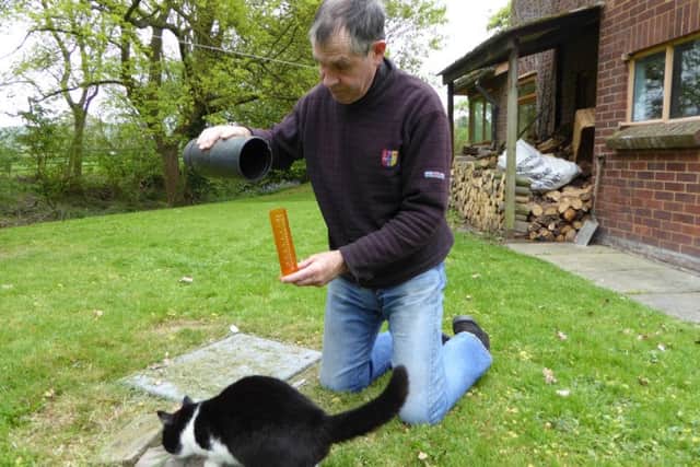 Measuring the rainfall - or lack of it. Picture Heather Jan Brunt