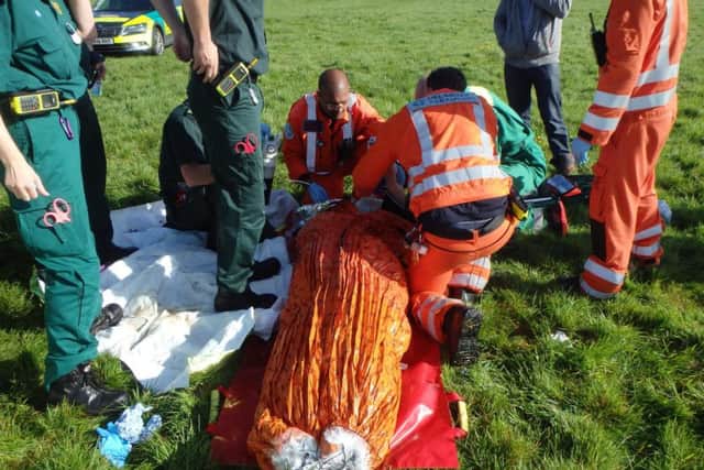 Paramedics at the scene of the accident near Earls Barton