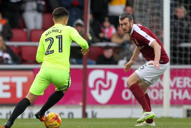 Zander Diamond in action for the Cobblers against Peterborough United