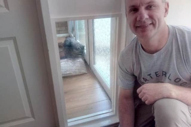 Marek and the racoon this morning.