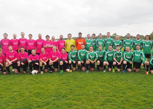 Teams representing Avon and Carlsberg met on the football field to raise money for the county-based breast cancer charity, Crazy Hats