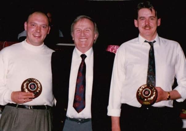 Ken Barton, centre, is Drayton Grange FC's honorary president