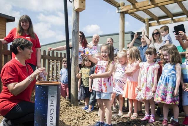 The children got to say what they were putting in the capsule.