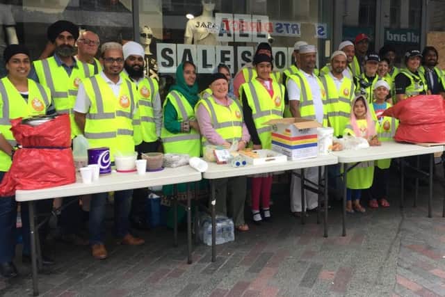 Volunteers from the Sikh and Muslim community got together on Sunday to help feed the homeless.