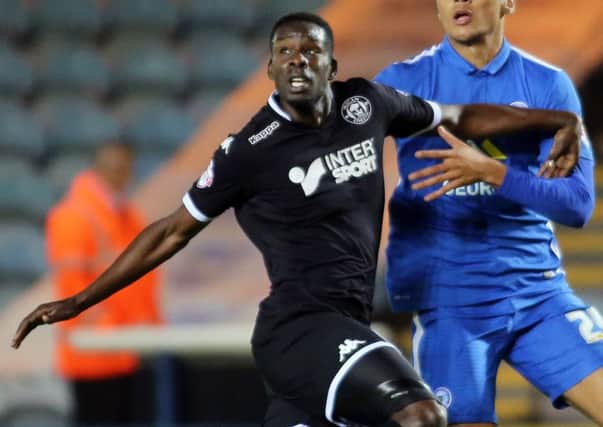 Leon Barnett in action for Wigan Athletic against Peterborough United in 2015