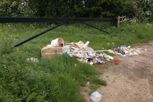A Northampton man has been fined after rogue building merchants dumped contents of his old bathroom in Castle Ashby.